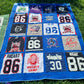 A photo of the ricart jerseyblanket outside in the grass